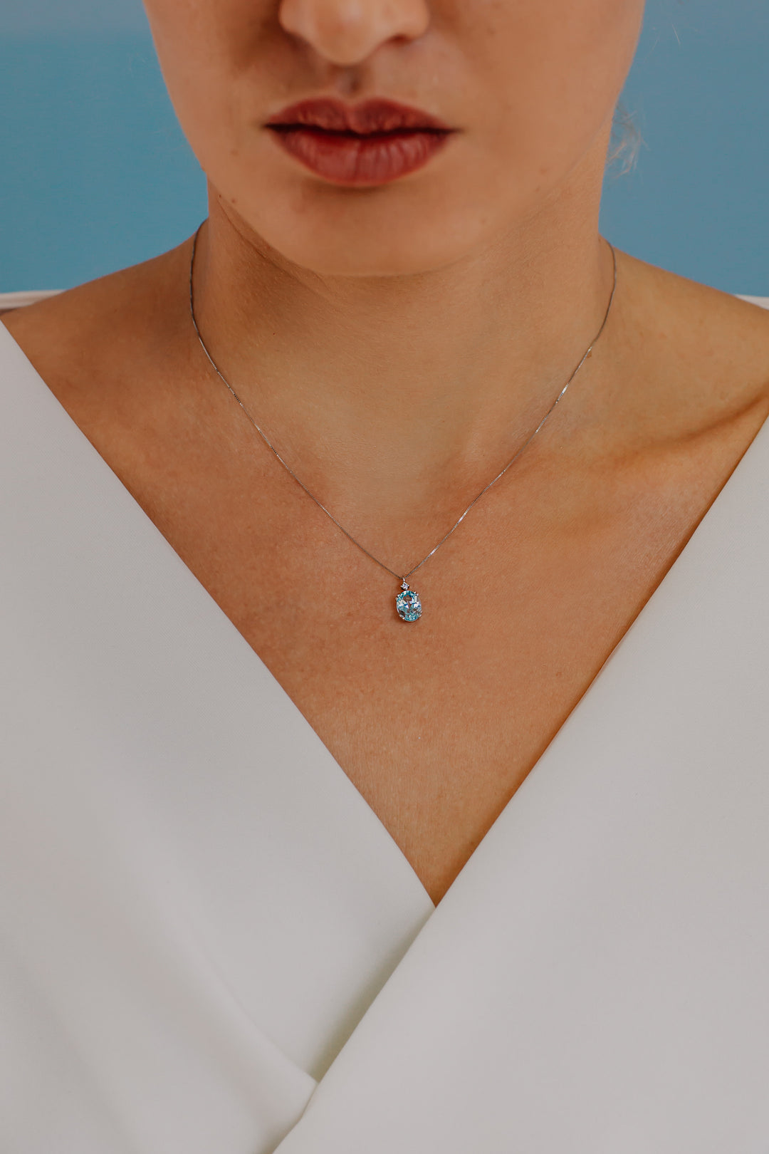 Collier Comete en Or et Topaze Bleue Ovale GLB1206