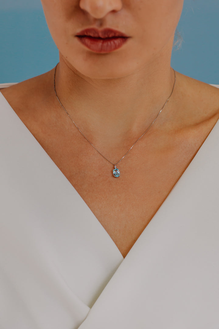 Collier Comete en Or et Topaze Bleue Ovale GLB1206