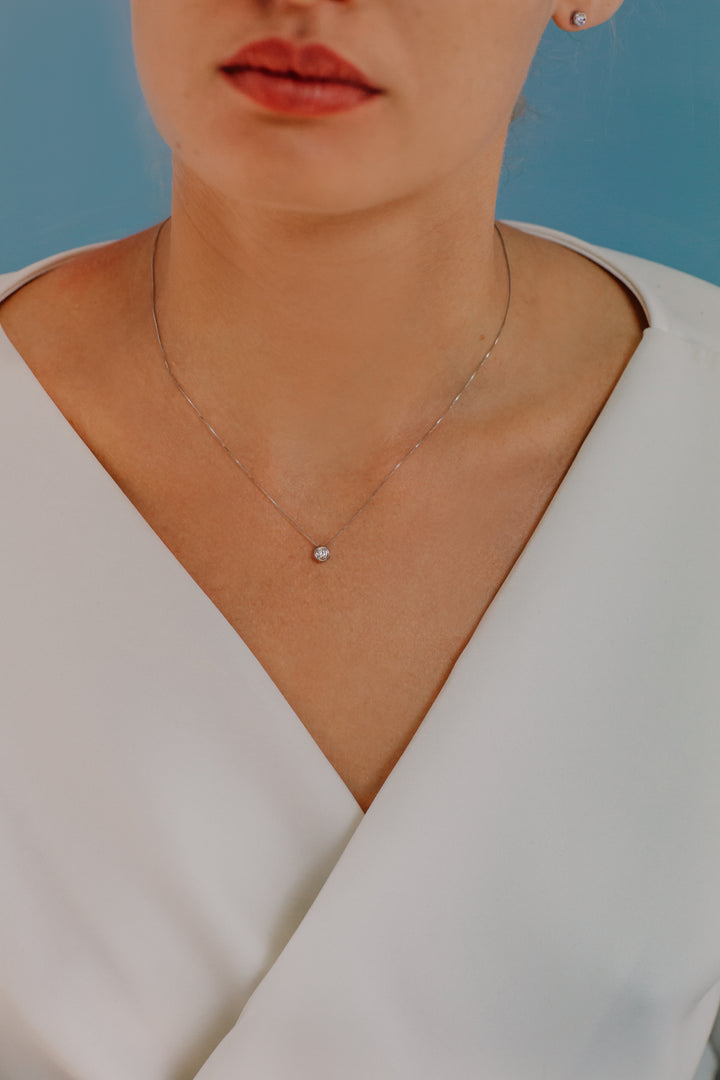 Comete Collana Punto luce tondo in Oro e Diamante GLB1416