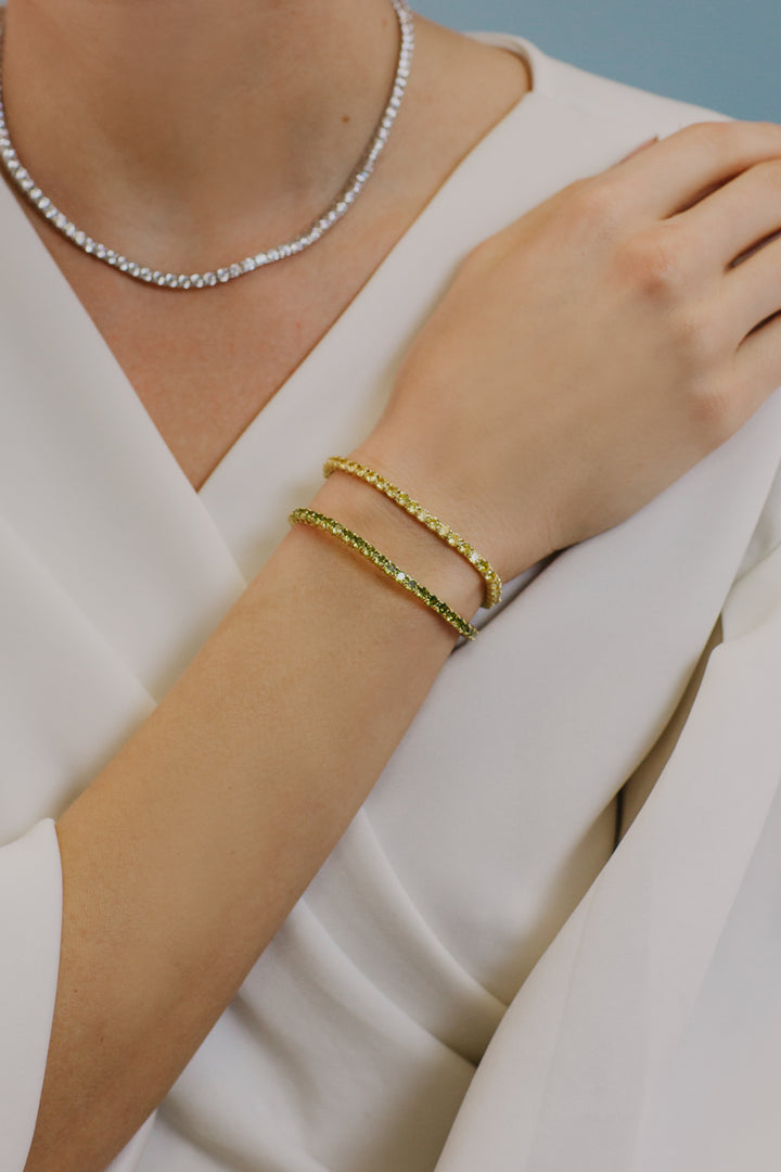 Comete Tennis in Argento giallo e zirconi Peridot BRA239M16
