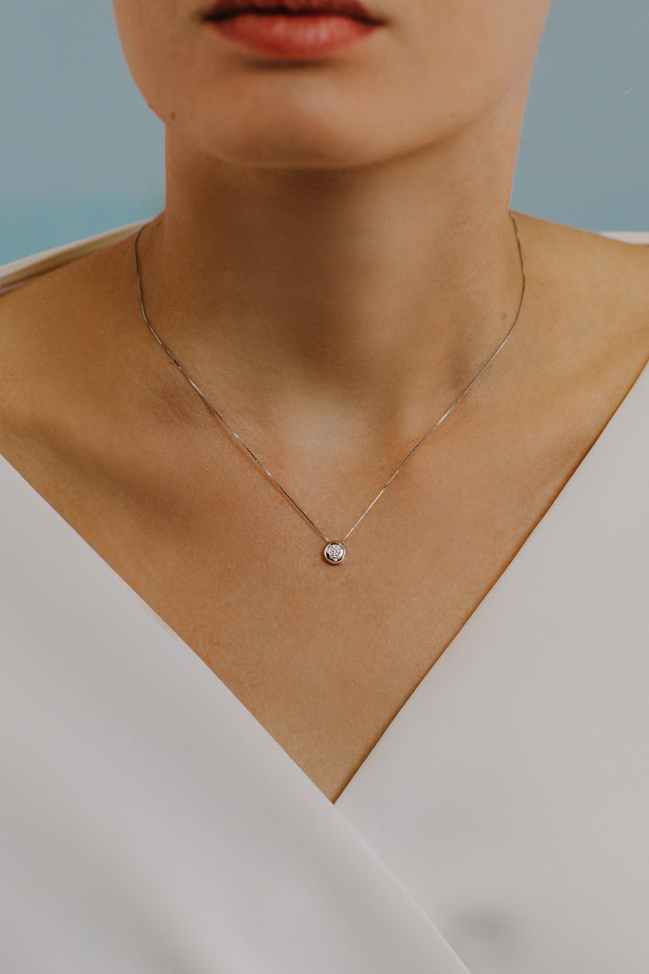 Comete Girocollo Punto luce tondo in Oro e Diamante GLB1024