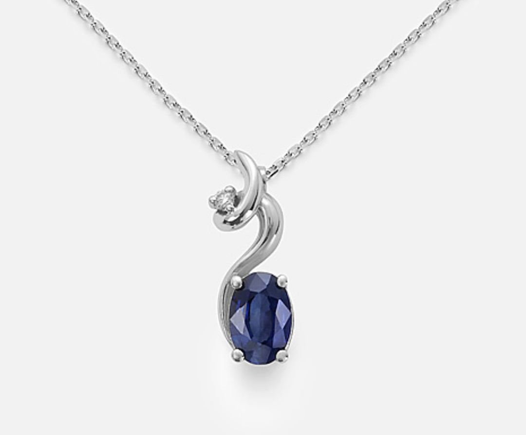Nihama cl 18k zaffiro n. ovale 6x4 ct.0,62 diam. ct.0,01 ND5024O4ZFN062
