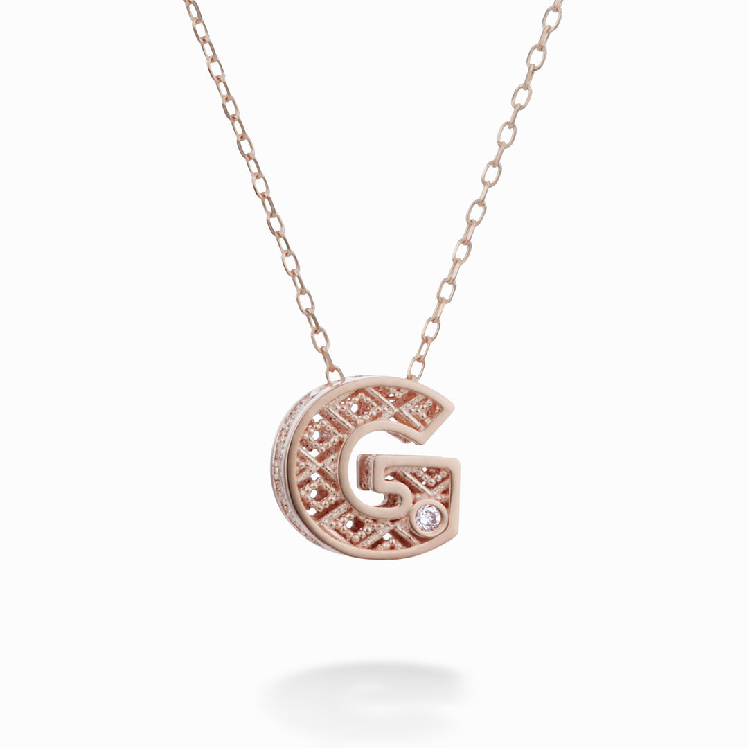 Mikiko cl 18k lettera g oro rosè diam. ct.0,01 MDLETGO3