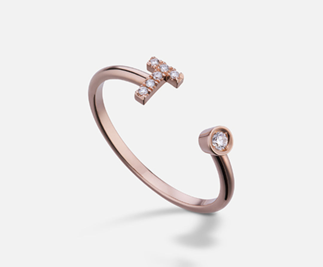 Golay une lettre t 9 carats petit diamètre en or rose. ct.0,06 GAFTD1R3