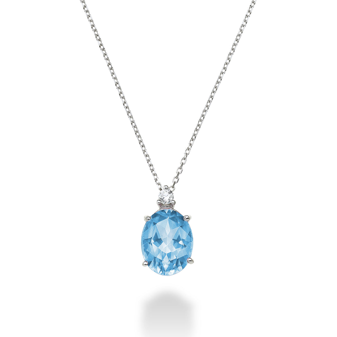 Mikiko cl 18k topazio azzurro ovale 7x9 ct.2,10 diam. ct.0,04 MD5110O4TPAZ