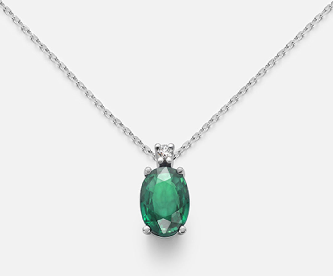 Nihama cl 9k smeraldo ovale 7x5 ct.0,60 diam. ct.0,015 ND5035R4BE